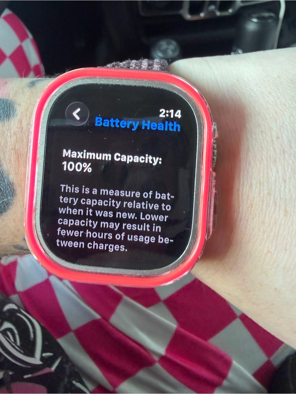 Apple Watch with Red Protective Case and Pink Band
